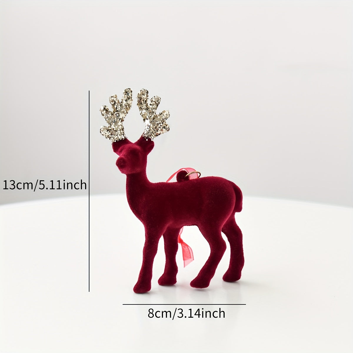 Burgundy Velvet Reindeer Ornament
Informações
