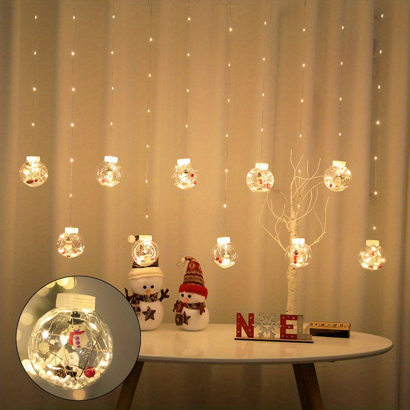 Christmas Curtain Lights with snowman inside and a table