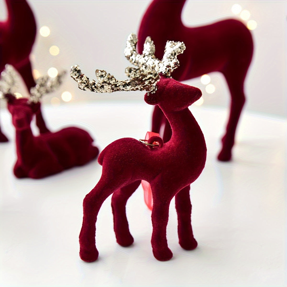 Burgundy Velvet Reindeer Ornament
Informações
