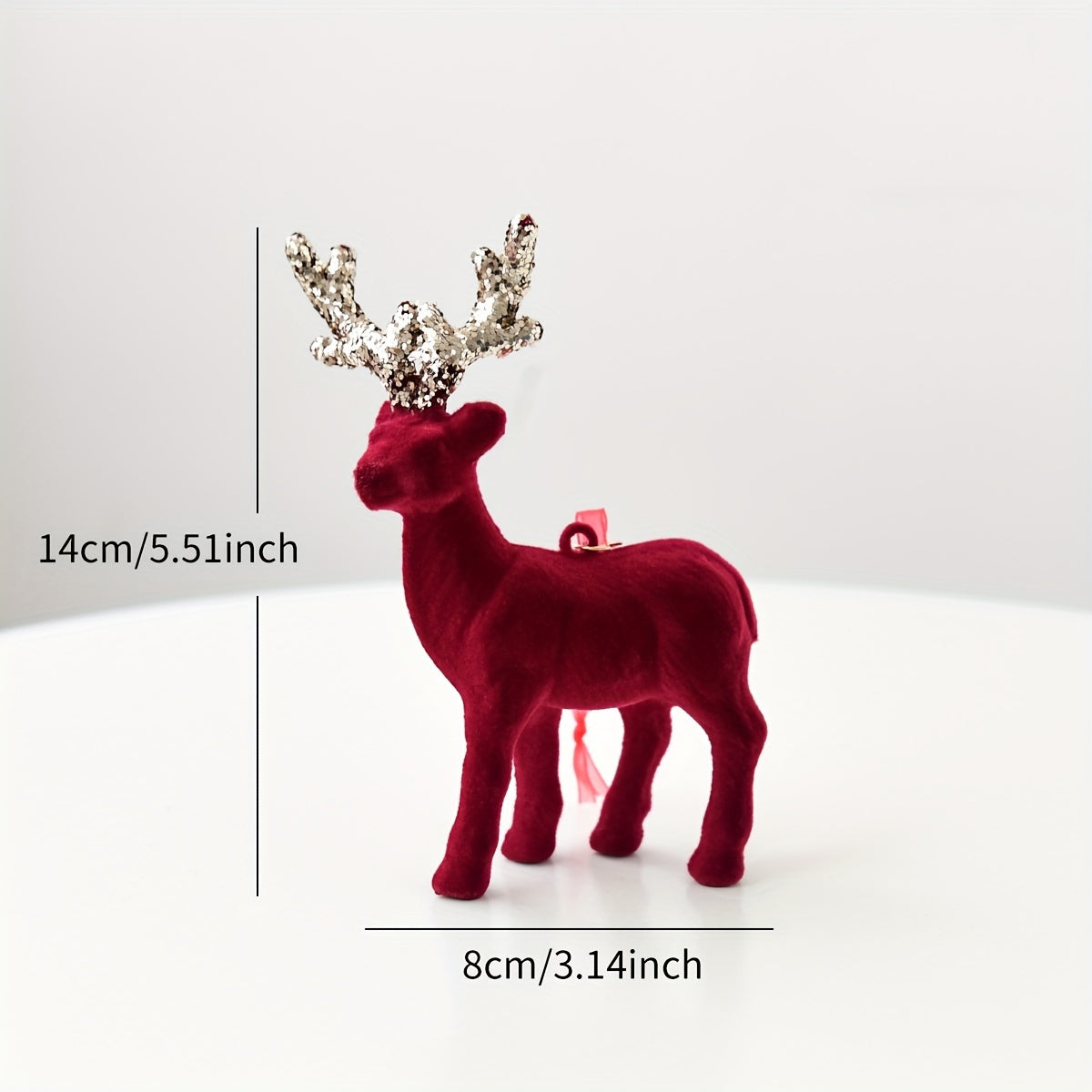 Burgundy Velvet Reindeer Ornament
Informações
